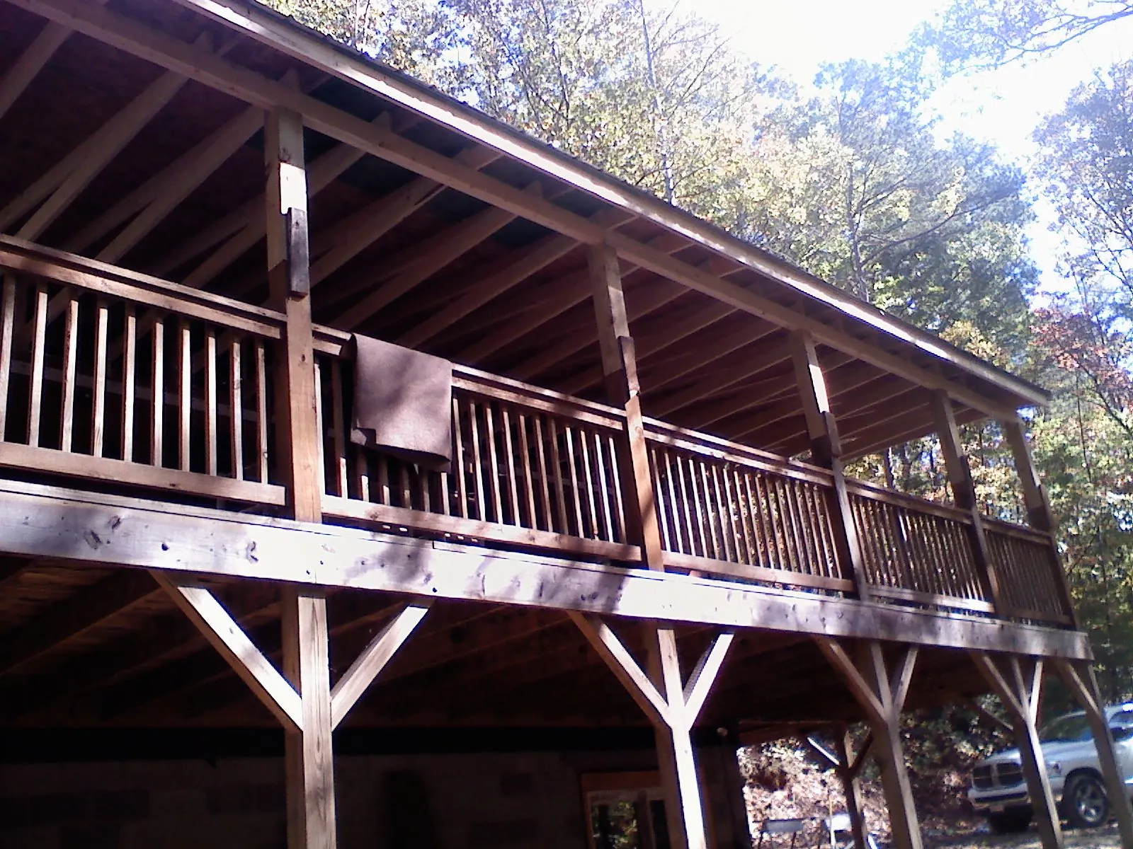Timber framing under a new elevated porch and deck — Roof Leak Repair in Lakewood by Roofing Brothers